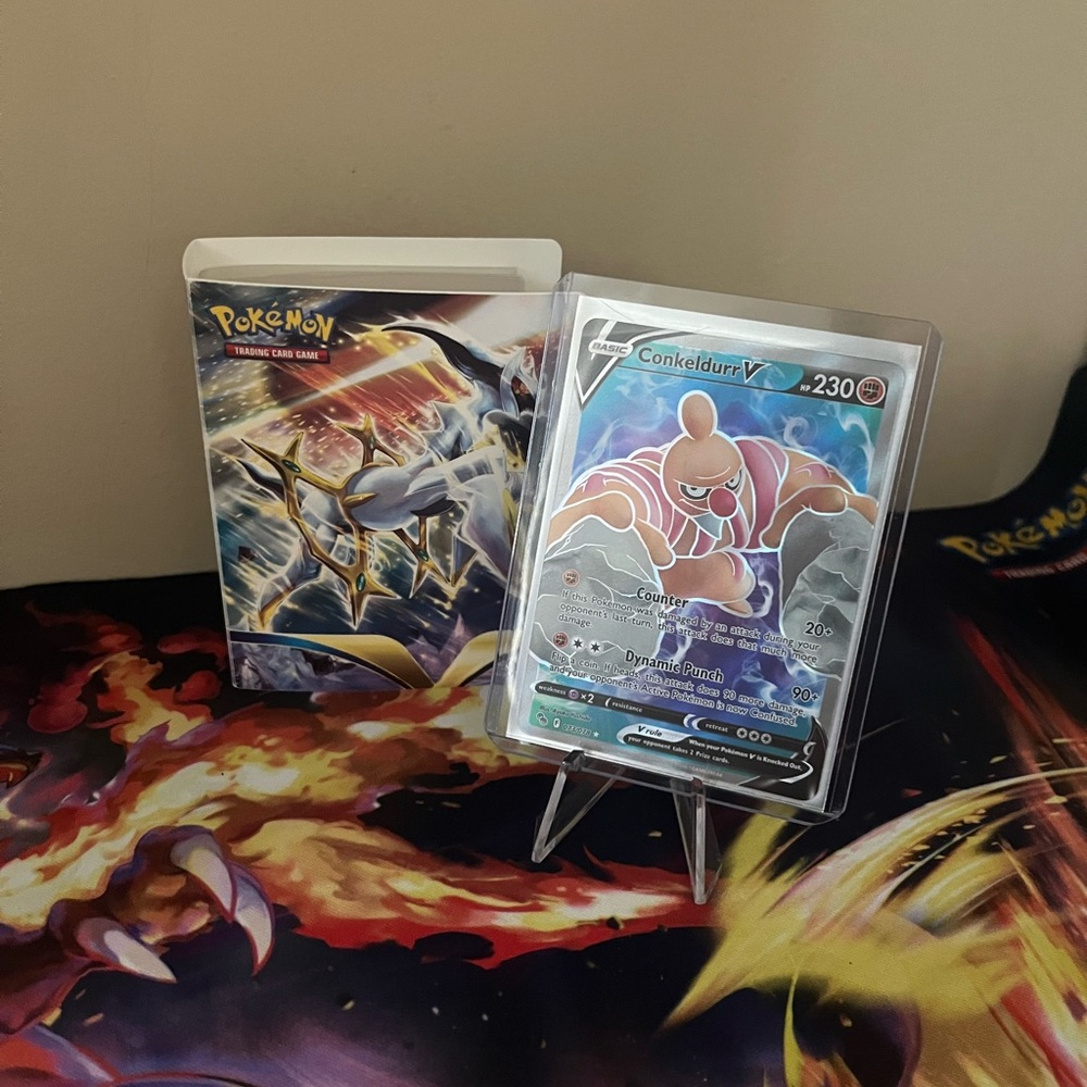 Conkeldurr V Pokémon Card with Small sorting booklet